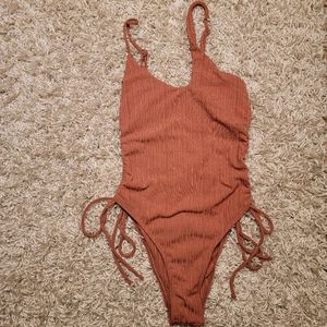Swimsuit with off-balance neckline